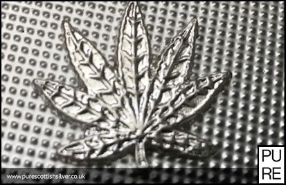 Silver hand poured cannabis leaf