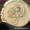 2 troy oz double thistle silver round